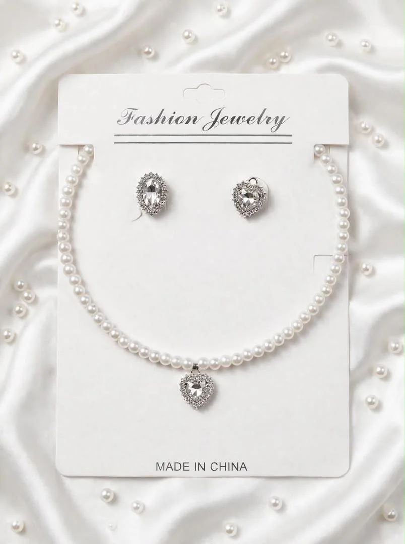 Pearl necklace and earrings with crystal heart