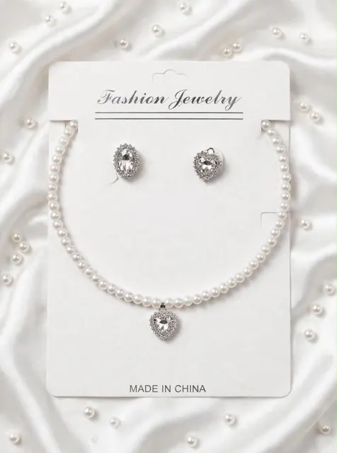 Pearl necklace and earrings with crystal heart